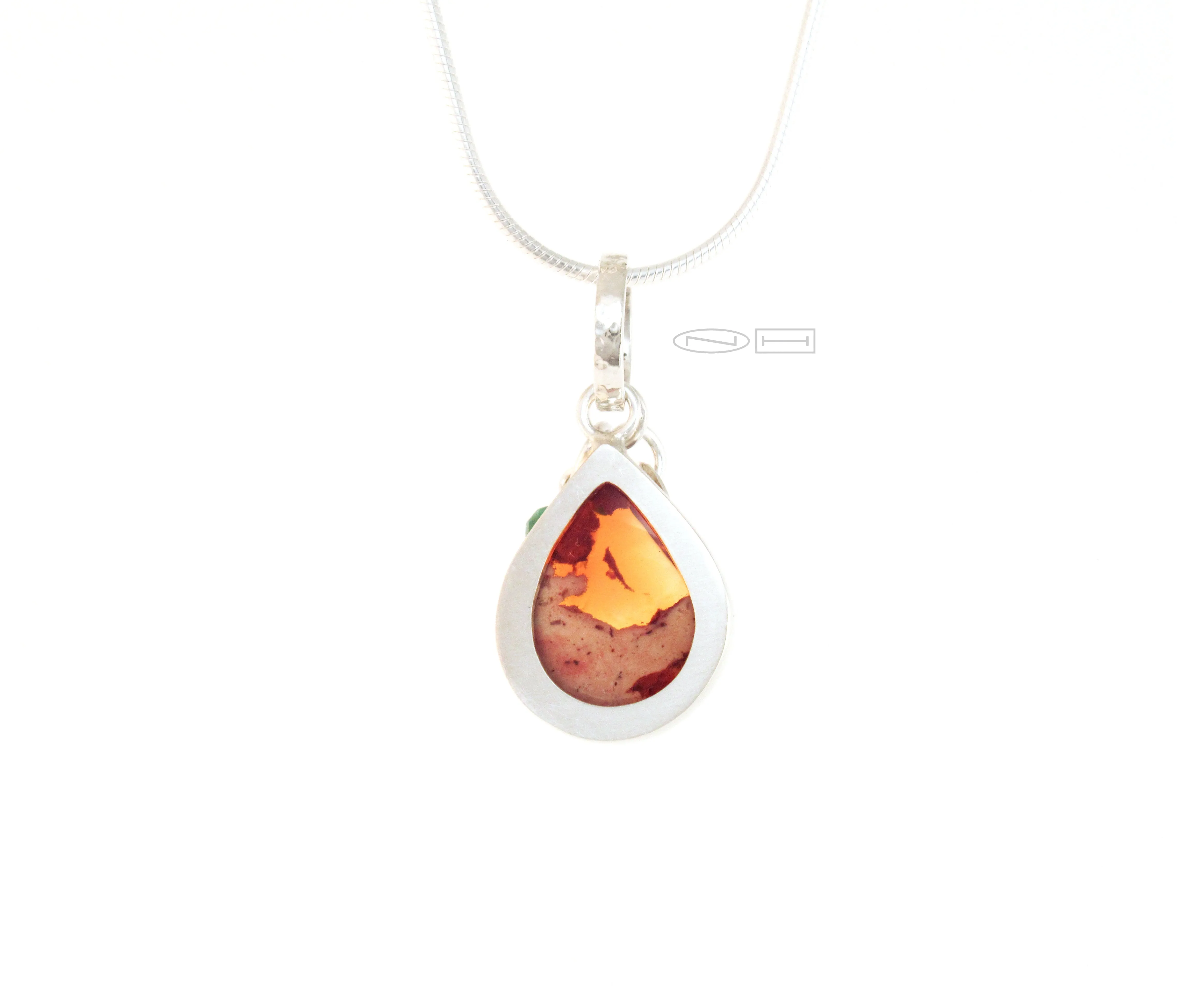 Fire Opal with a touch of emerald power ( SOLD)