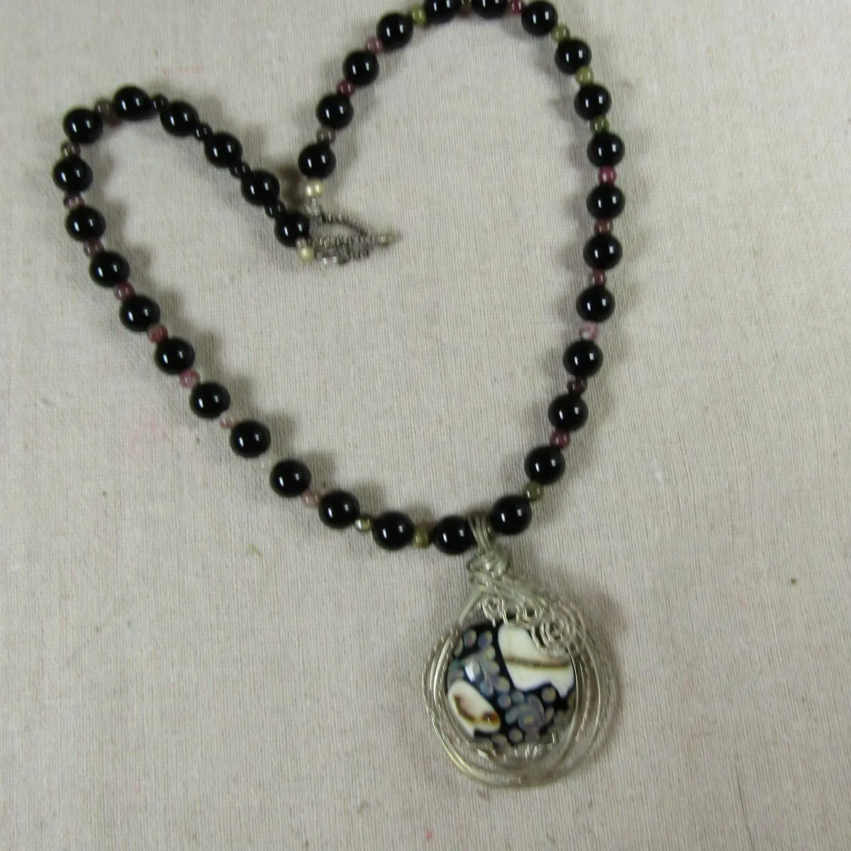 Onyx Necklace with Wire Wrapped Black and White Lampwork Pendant